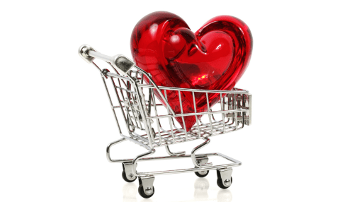 Ein Herz steht in einem Einkaufswagen - Symbolbild für den Flirtkurs-Shop.